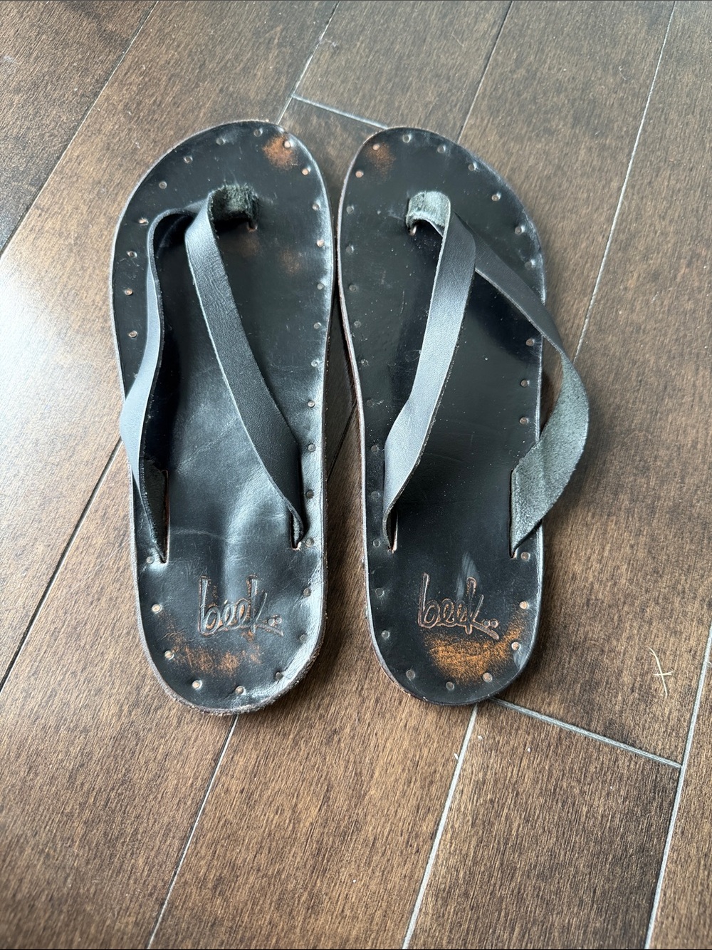 Black Leather Flip Flop Sandals with Studded Trim